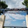 The entrance sign from looking underneath the structure.
